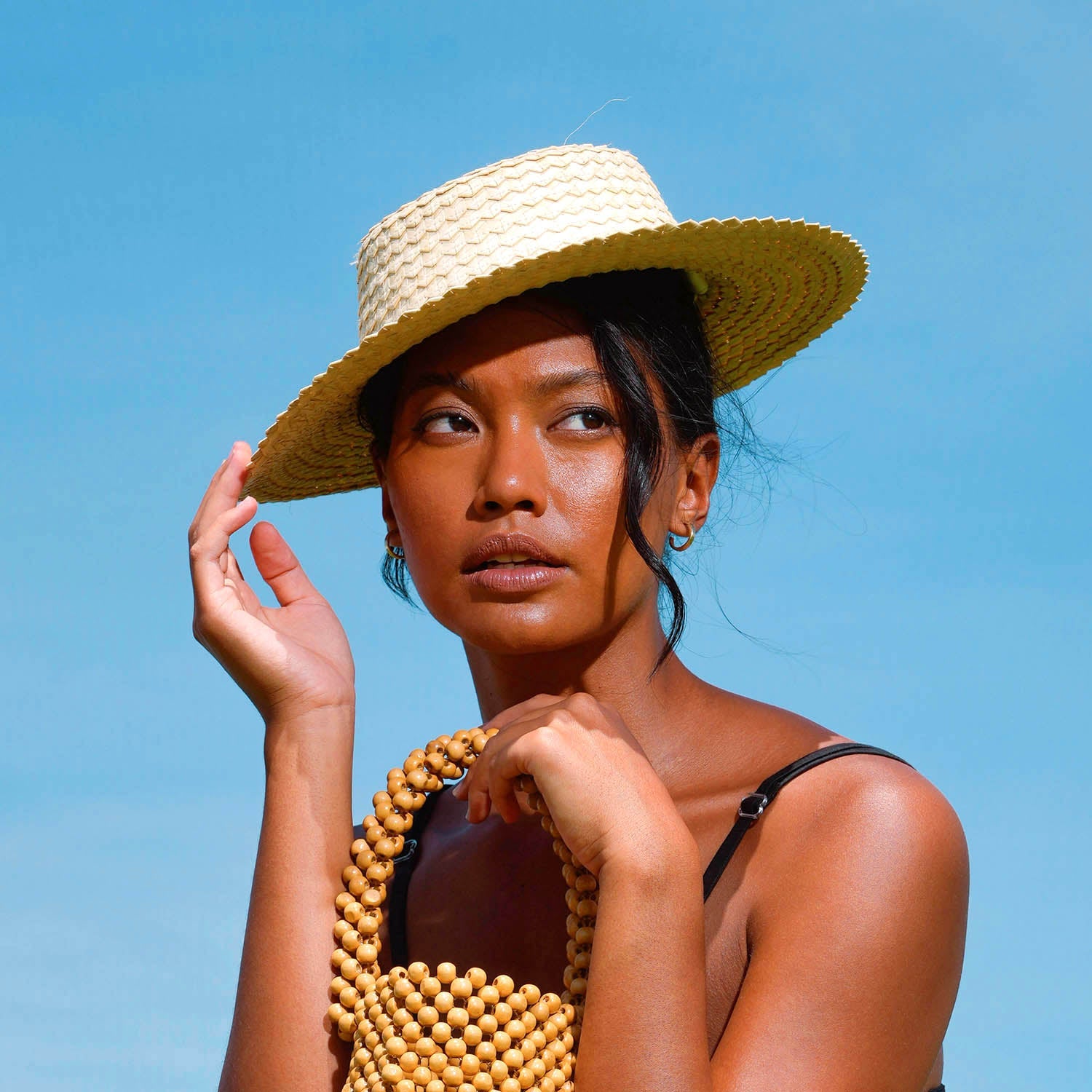 woven straw hat in beige
